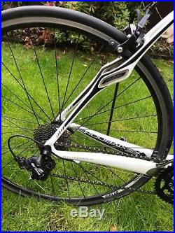 Mens White Specialized Roubaix Carbon Road Bike Shimano 105 Schwalbe FACT 8R 56